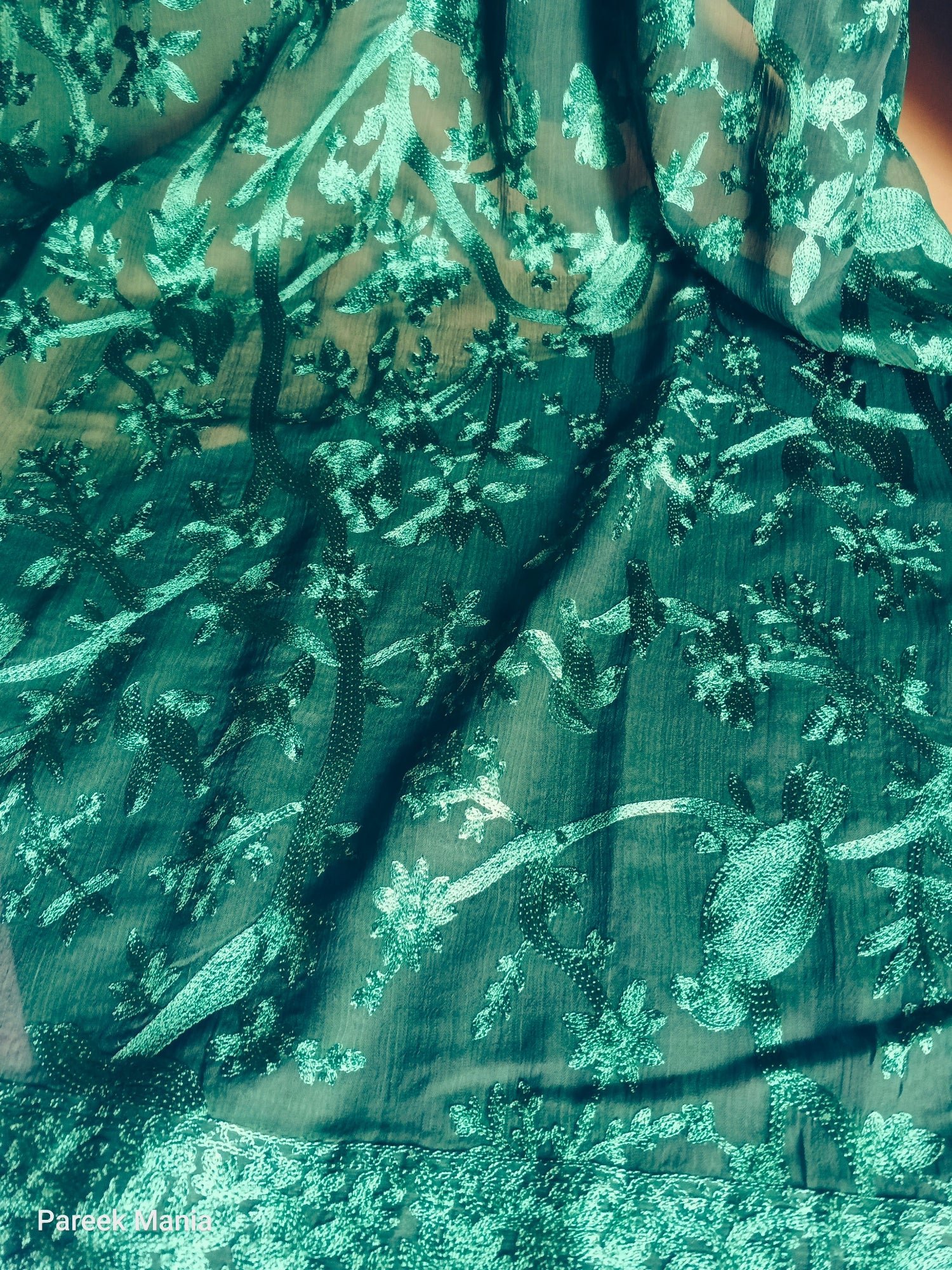 Emerald green soft Chiffon dupatta from Pareek Mania’s luxury collection, featuring intricate self-on-self Aari embroidery with floral and vine motifs, 2.7+ yards length, perfect for festive and casual wear in traditional Pakistani fashion.